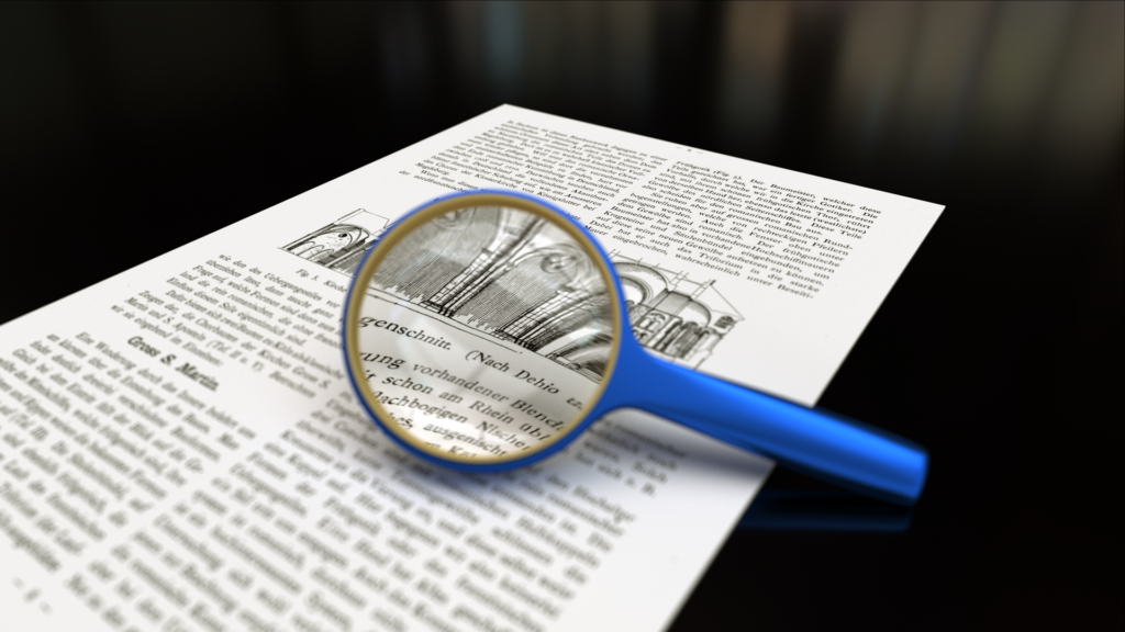 Lente di ingrandimento appoggiata su un documento stampato fitto di righe di testo